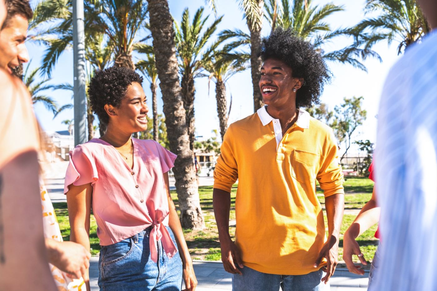A group of friends laughing together outdoors